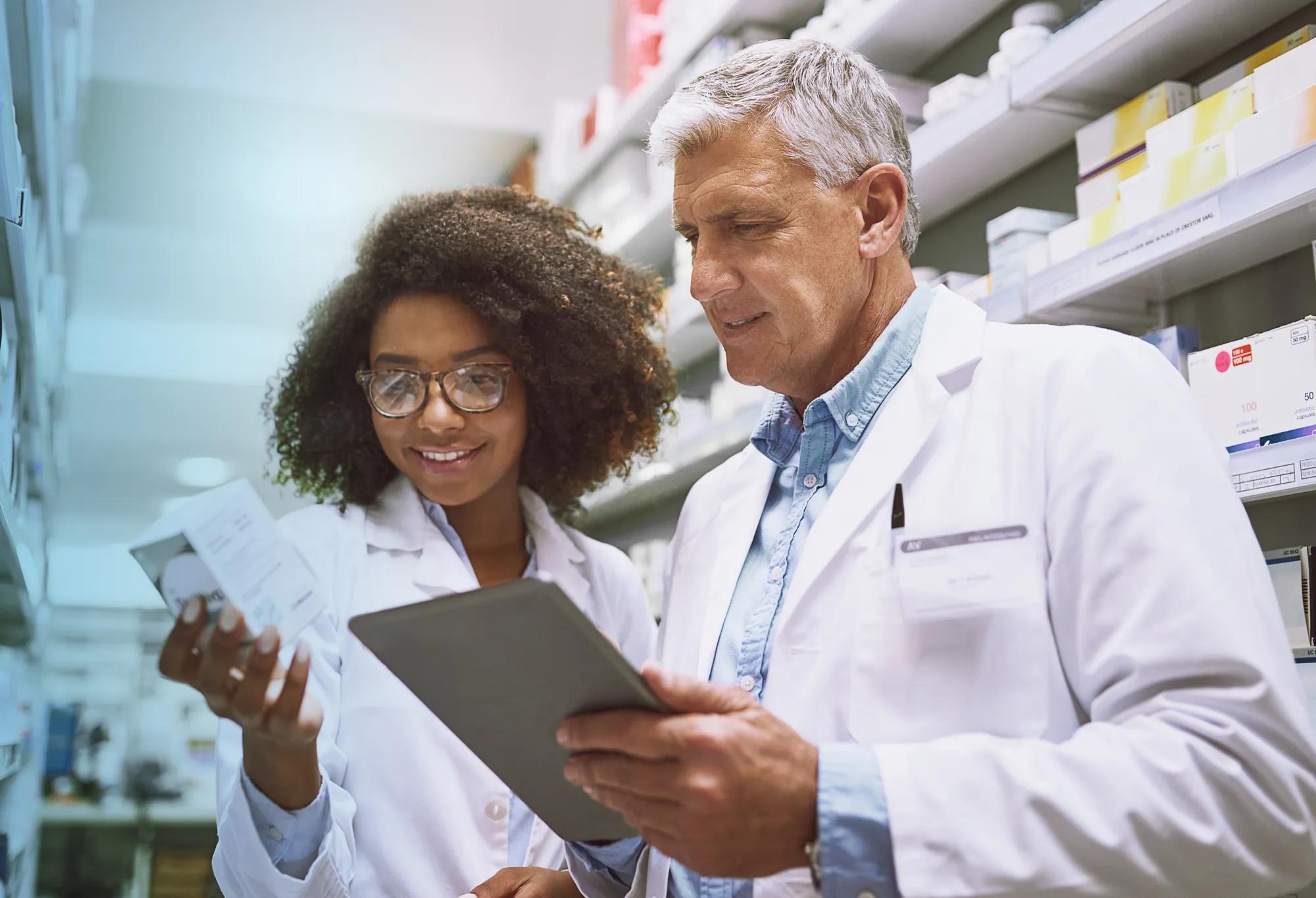 a licensed pharmacy technician and certified pharmacy technician working in a pharmacy