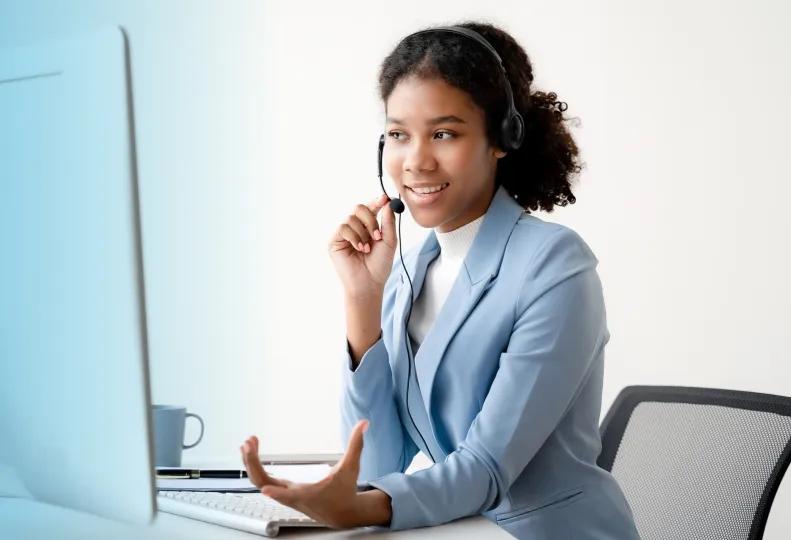 a woman working in a healthcare office job after completing a program at a healthcare training institute