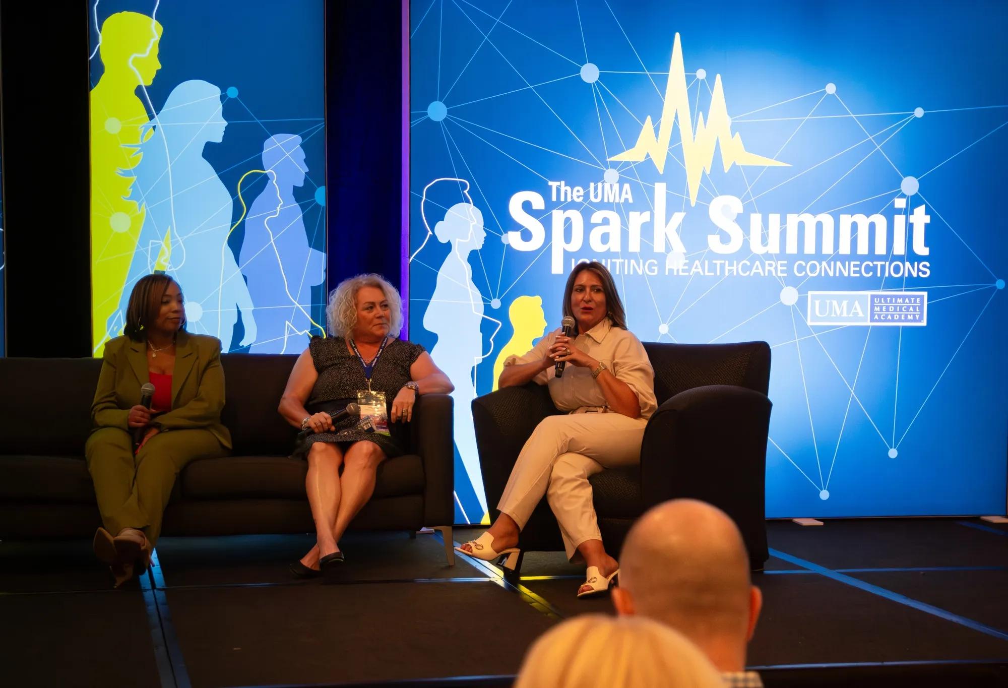 panel discussion members on stage at Spark 2026