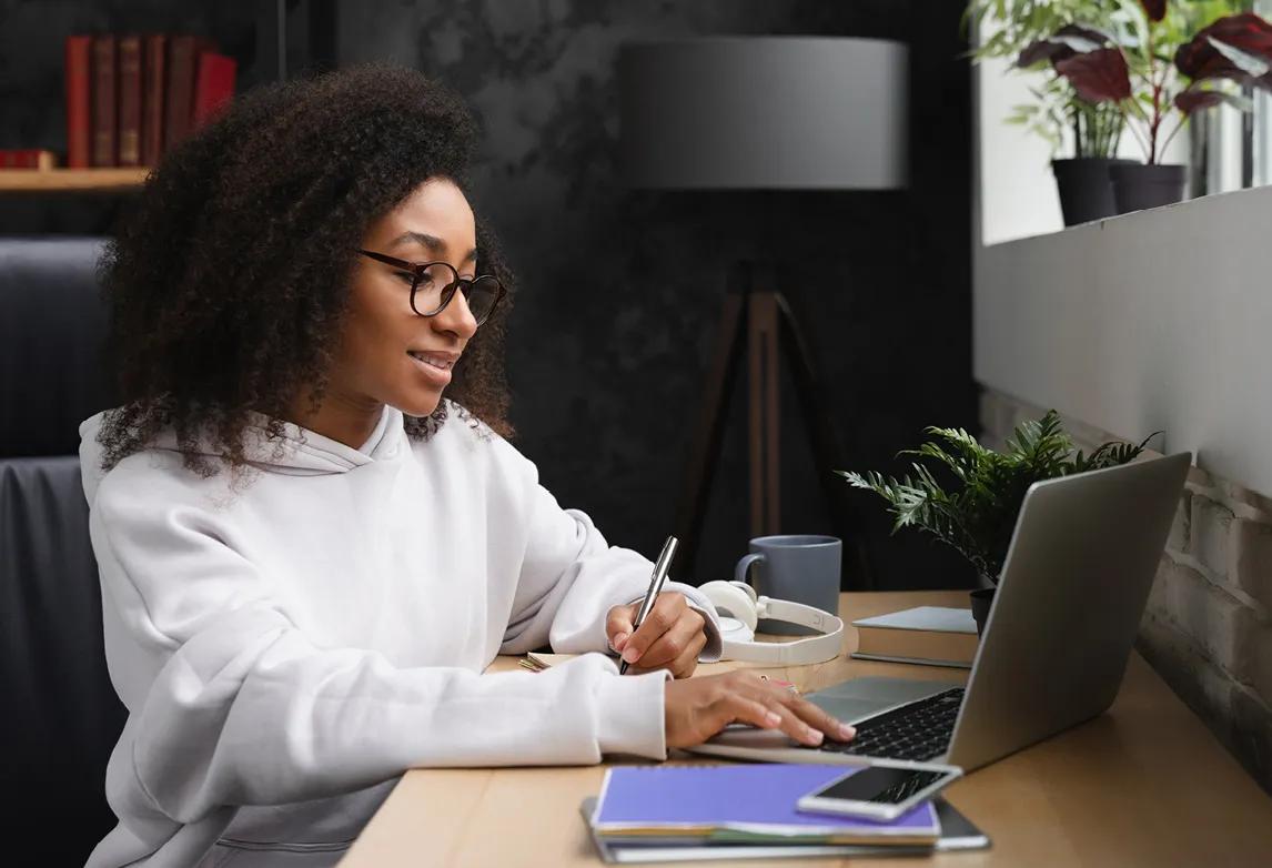 a student practicing internet safety while earning her online healthcare degree