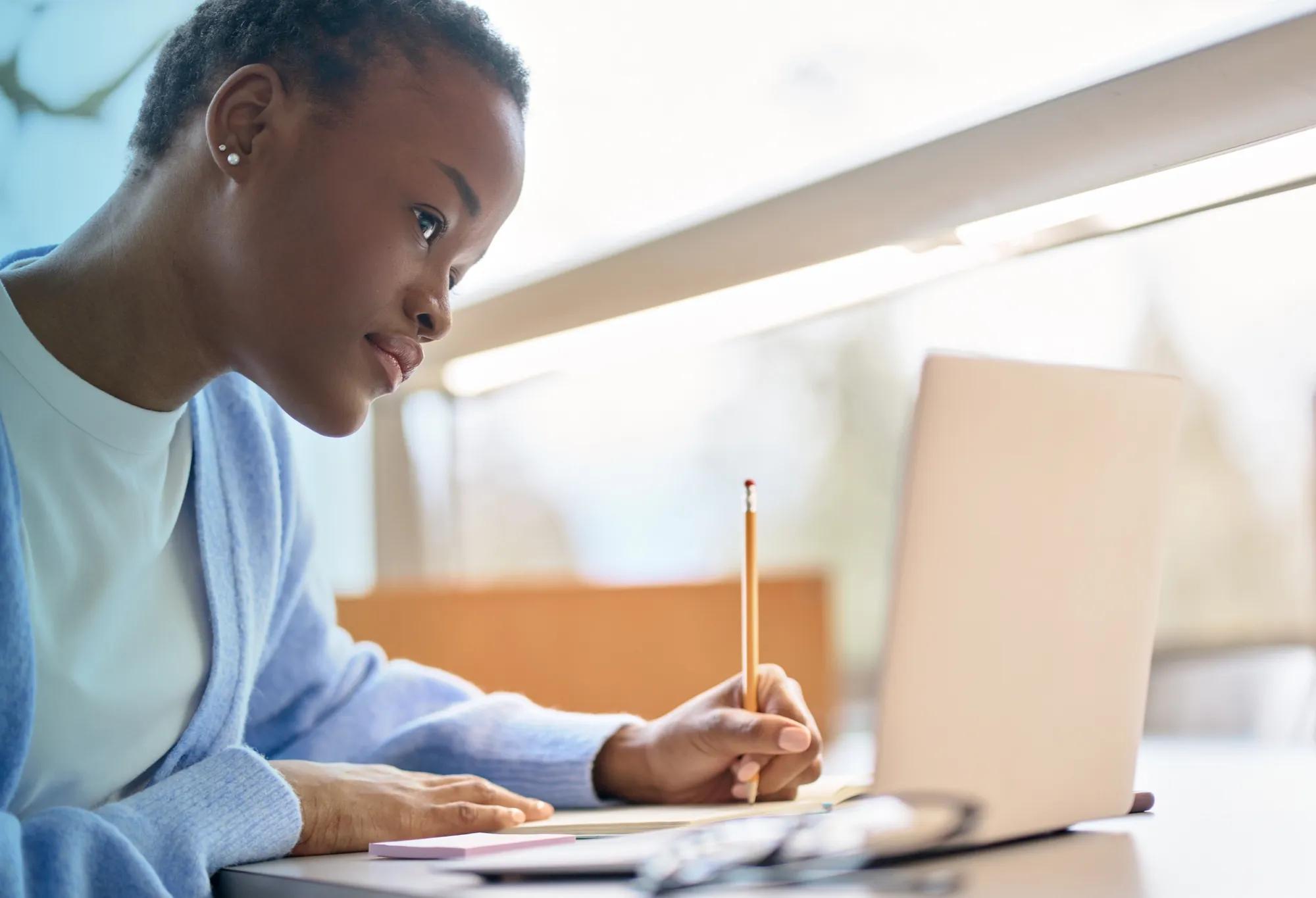 Medical billing and coding professionals working on computers