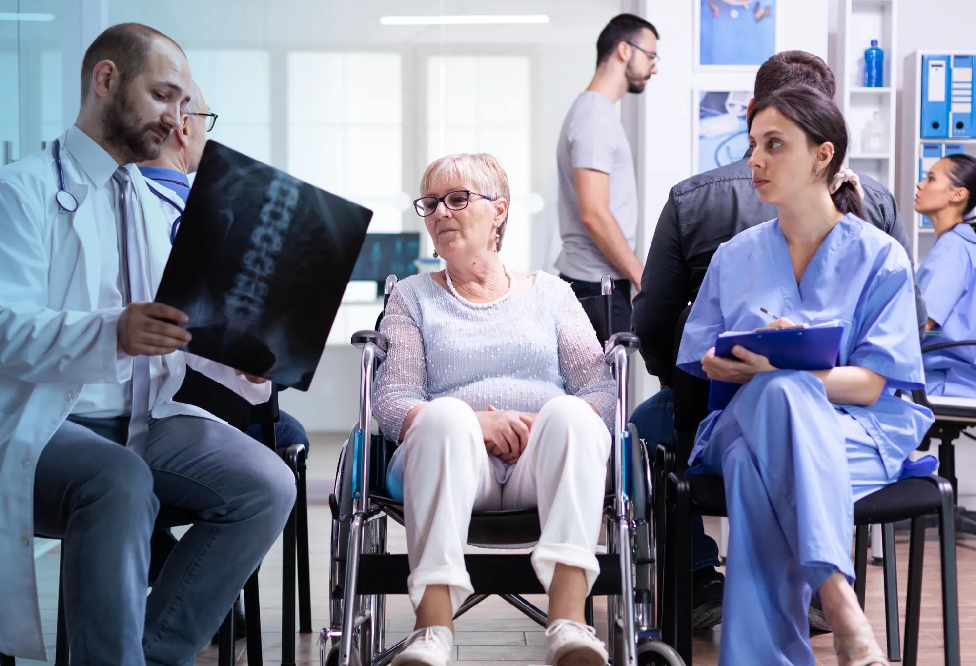 Image of a healthcare worker team in scrubs.