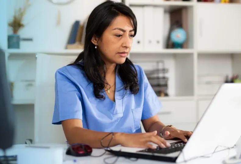 a healthcare worker writing their professional development goals