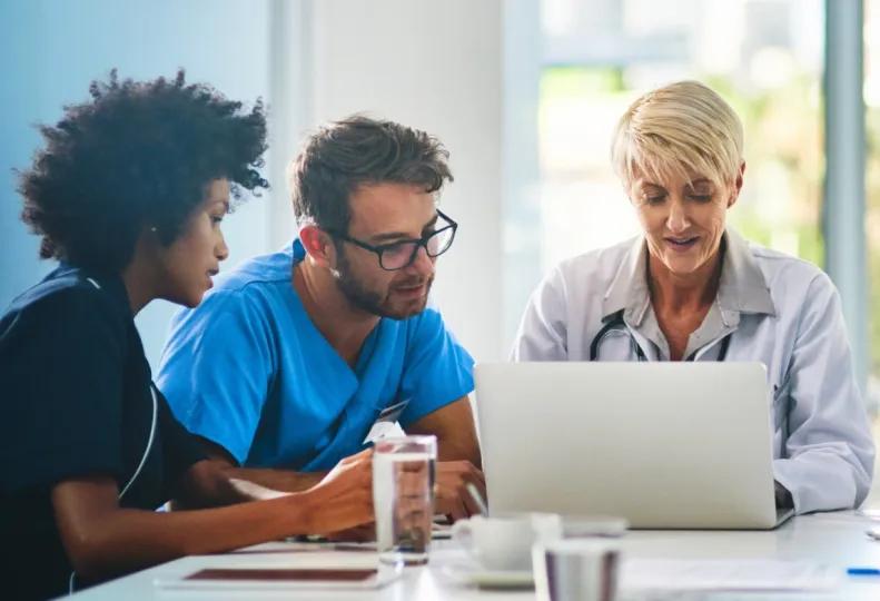 a health and human services professional helping a client after completing HHS classes