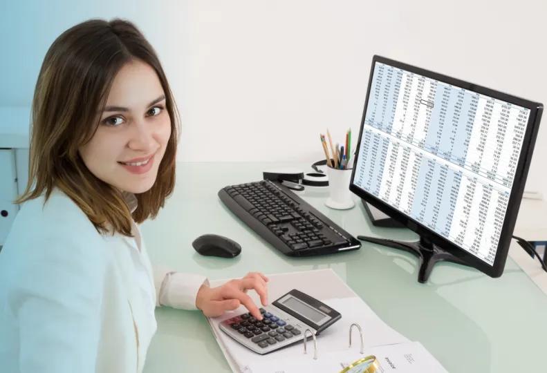 a medical billing and coding career professional working on a computer after completing medical billing and coding classes online